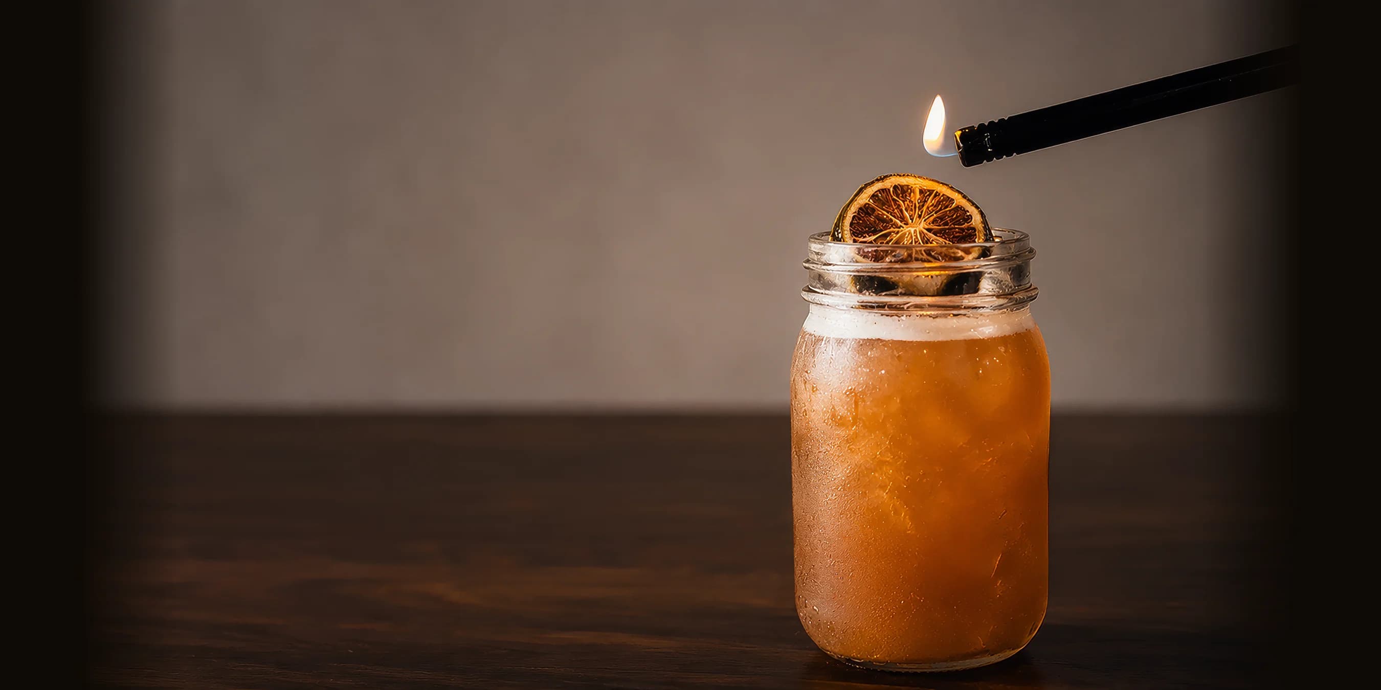 Craft cocktail in a mason jar at The Mason Jar bar in downtown Greer SC